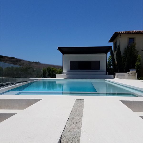 white infinity pool with built-in spa, by Monaco Luxury Pools