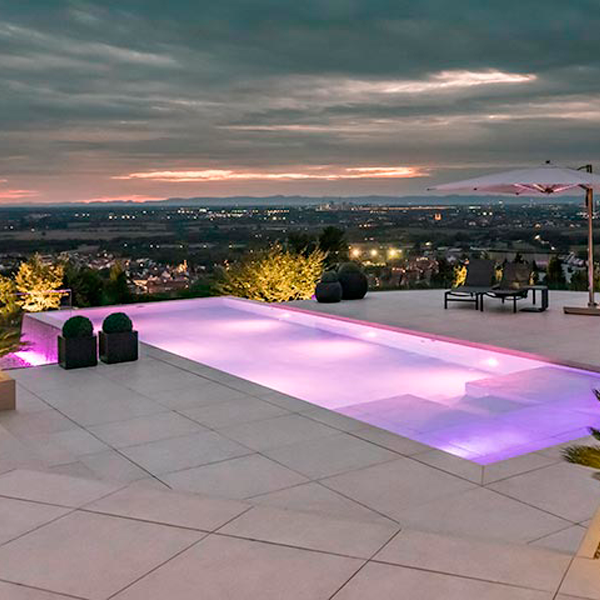 infinity pool by MLZ Pools at night