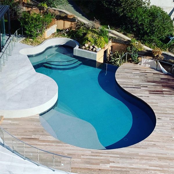 dron view of a custom infinity pool with reinforced liner coating, by SO.CO.FI