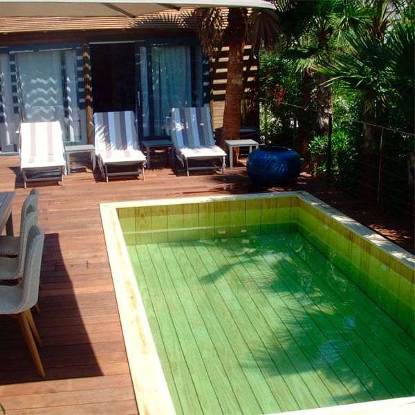 wood pool and wooden deck by Odyssea Piscines
