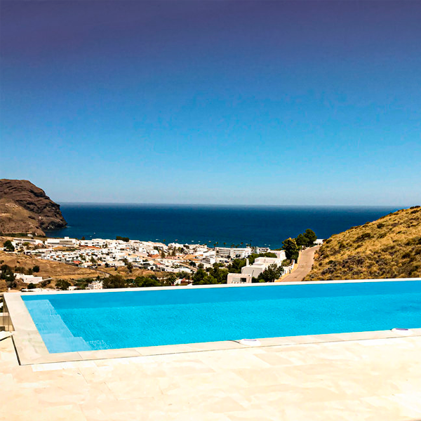 infinity pool in a top hill by Indalpool