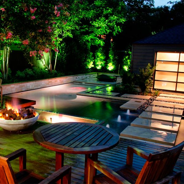 private pool and garden at night, by Pool Environments