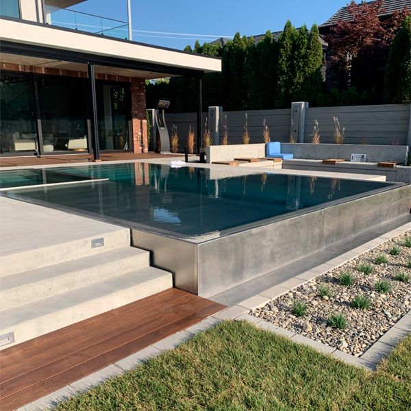 stainless steel infinity pool with built-in spa, by Pure Stainless Pools