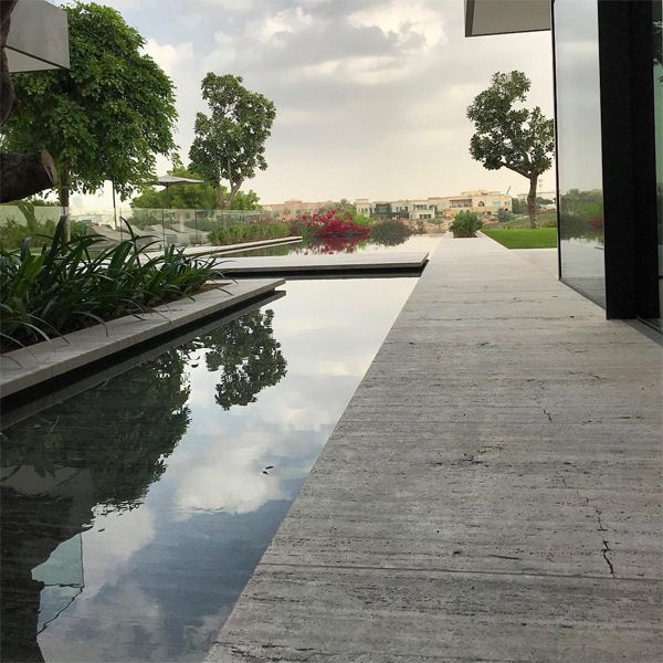 modern infinity pool and landscaping, by Satma International