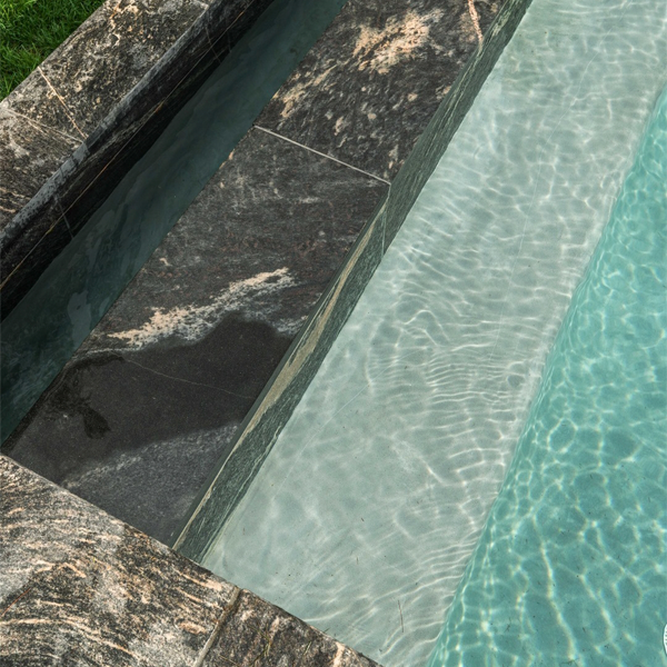 coating detail in an infinity pool and spa by Muskoka Pool Co