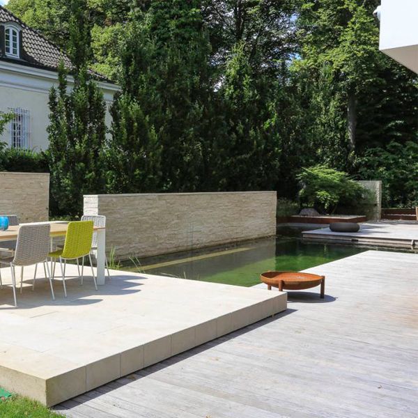modern design natural pool by Postdamer Gaerten