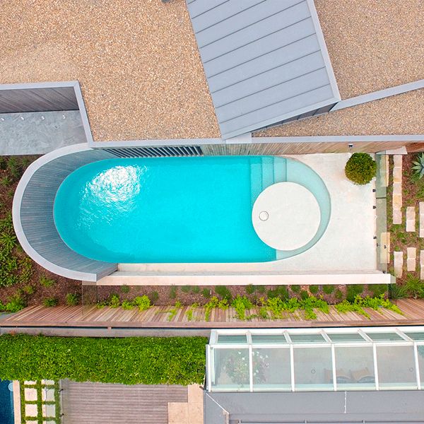 drone view of a rounded shaped custom mini pool by Focus Pools
