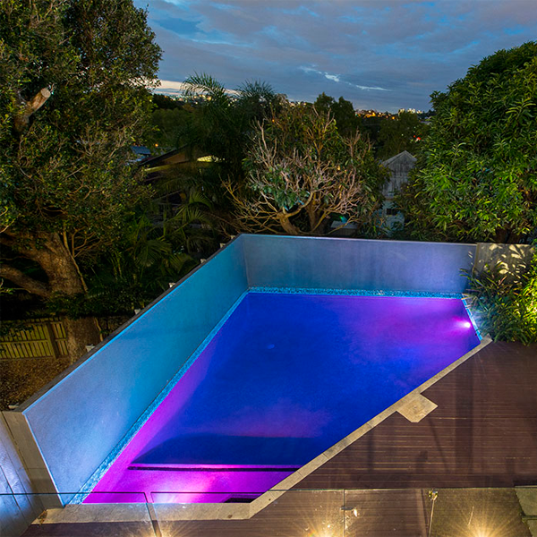 geometric pool lighted at night