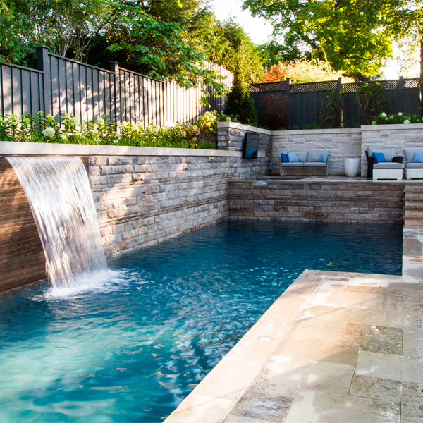 pool with waterfall and spa by Todd Pools