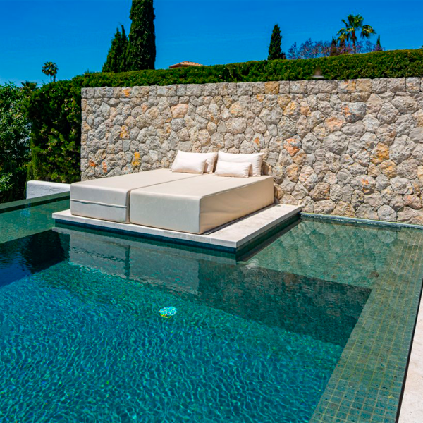 relax area in an infinity pool by Total Pool Concept