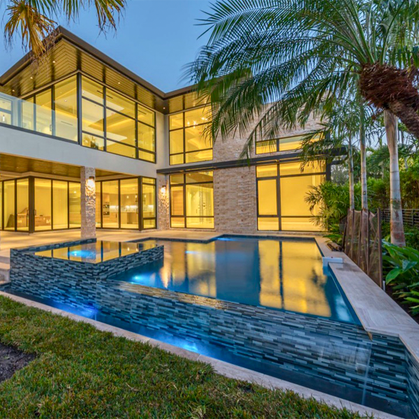 lighted infinity pool and spa, in a project by AZD Architects