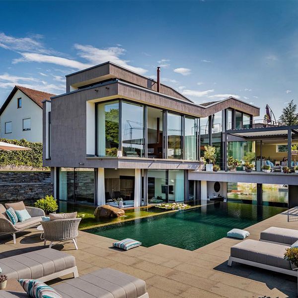 Natural pool in a modern house, by Schellheimer