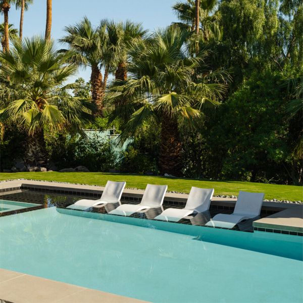 pool, relax area and garden in a project by Michelle Boudreau Design