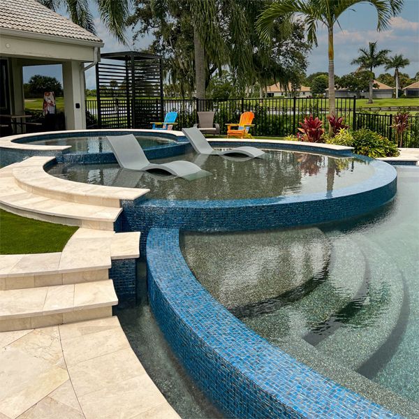 infinity pool in the shape of superimposed rings, by Lucas Lagoons