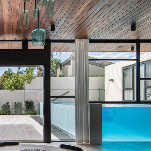 above ground pool with gtransparent window to house