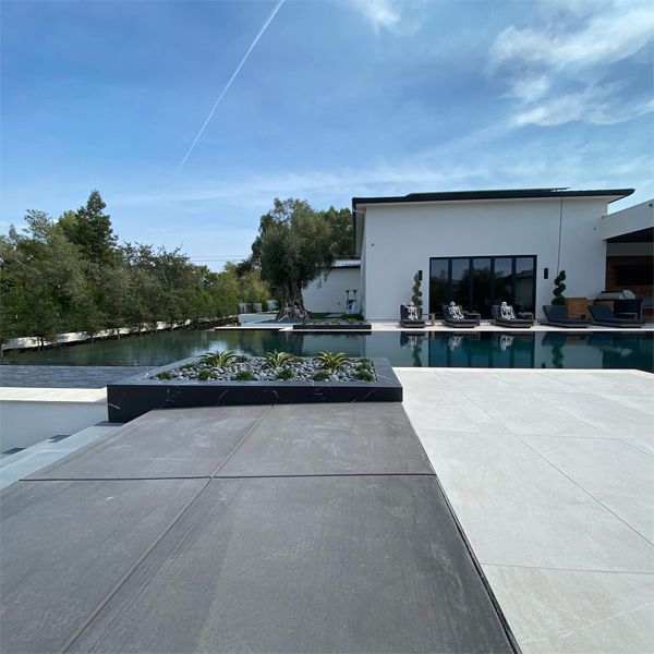 impressive mirror pool and spa in a project by Cosgrove Custom Pools