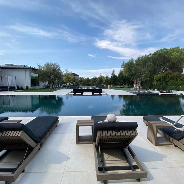impressive mirror pool and spa in a project by Cosgrove Custom Pools