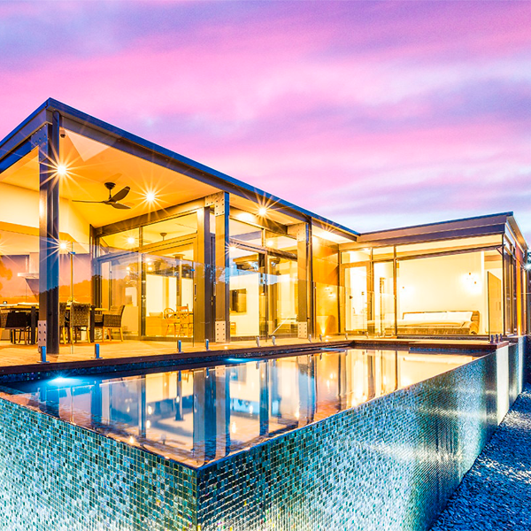 above ground infinity pool with spa by Aquacon Pools