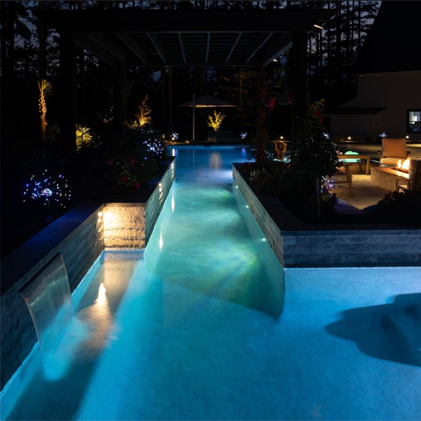 large private pool and spa in a project by Currin Outdoor Living
