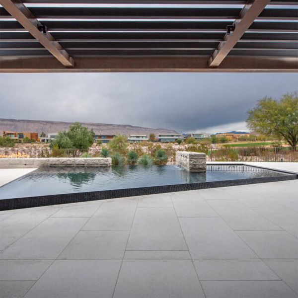 custom infinity pool with spa by Ozzie Kraft