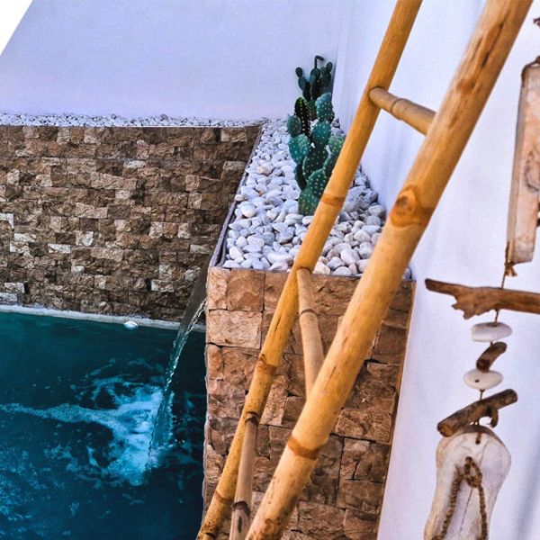 waterfall in a pool by Olipool