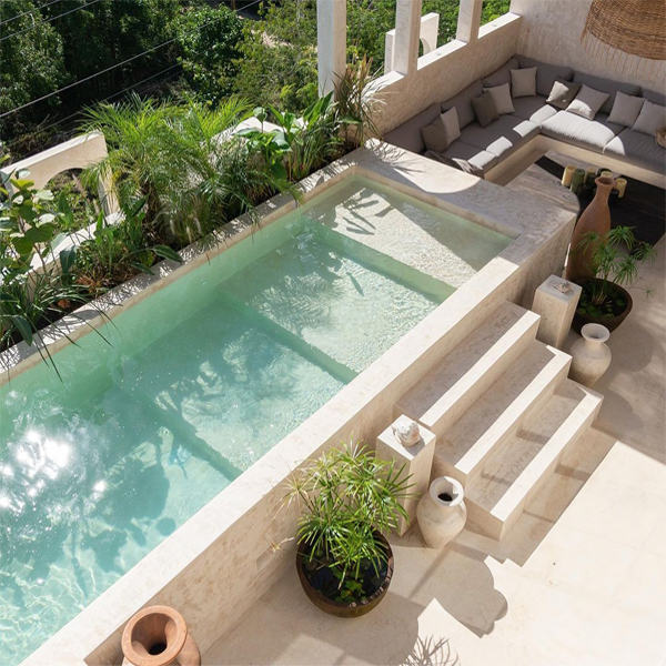 above ground white pool by Terreo Studio