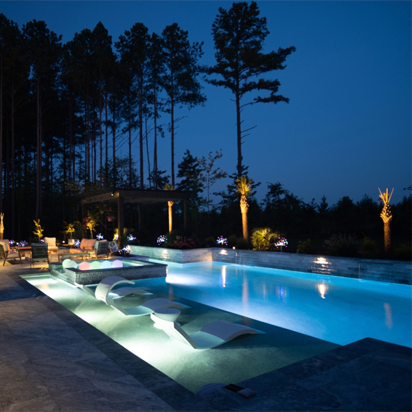 large private pool and spa in a project by Currin Outdoor Living