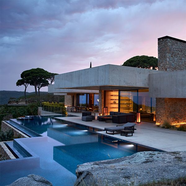 custom infinity pool at sunset, in a modern house project by Ramon Esteve