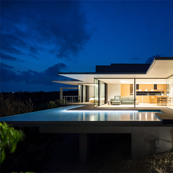 modern house with infinity pool by Kidosaki Architects Studio
