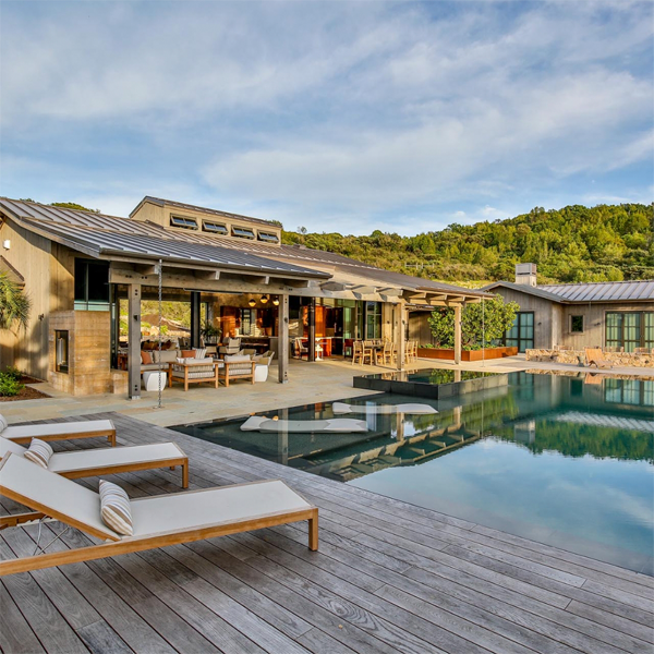 infinity pool and spa at sunset, by Roche and Roche Landscape Architecture