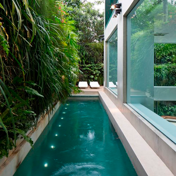 lap pool with underwater windows by Fernanda Marques