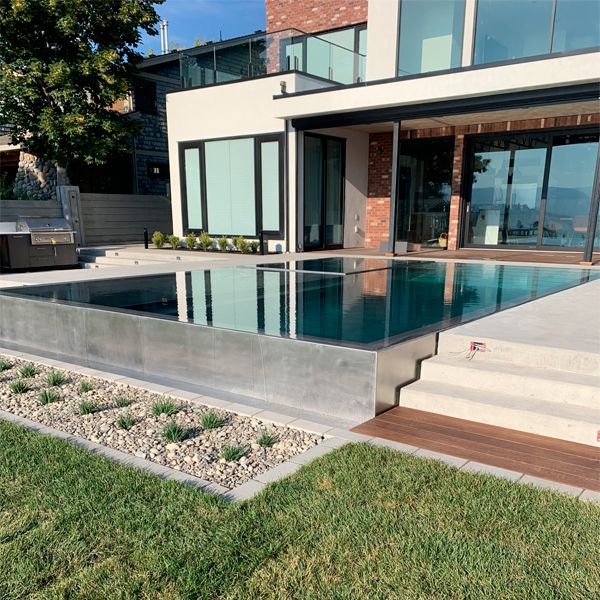 stainless steel pool with built-in spa, by Pure Stainless Pools