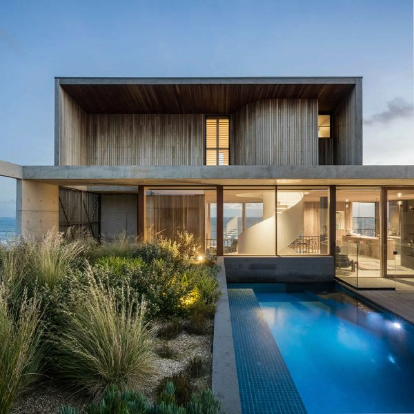 private lap pool at night, in a project by Auhaus