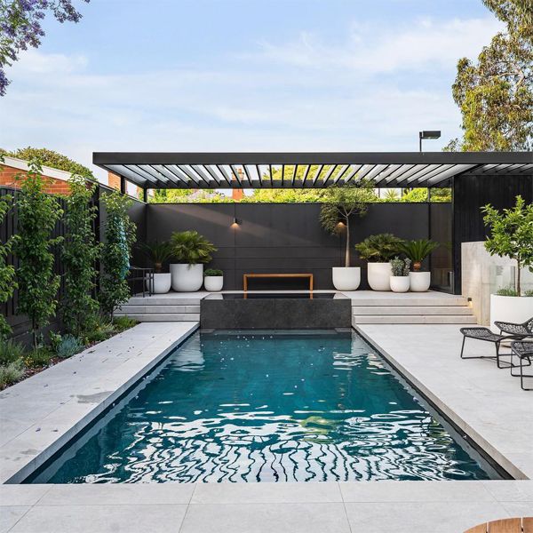 modern minimalist pool and infinity spa in contrast, by Aquacon Pools