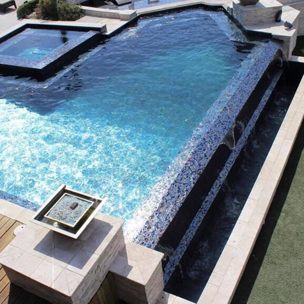 infinity pool and spa drone view by Pinnacle Exterior Construction
