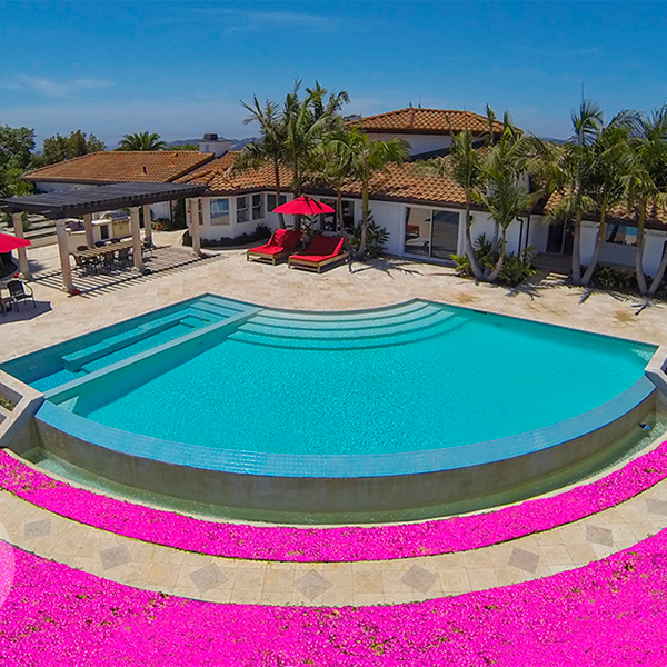 Rounded infinity pool with rose landscape