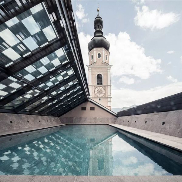 minimalist lap pool in a rooftop by Steglich Schwimmbadtechnik