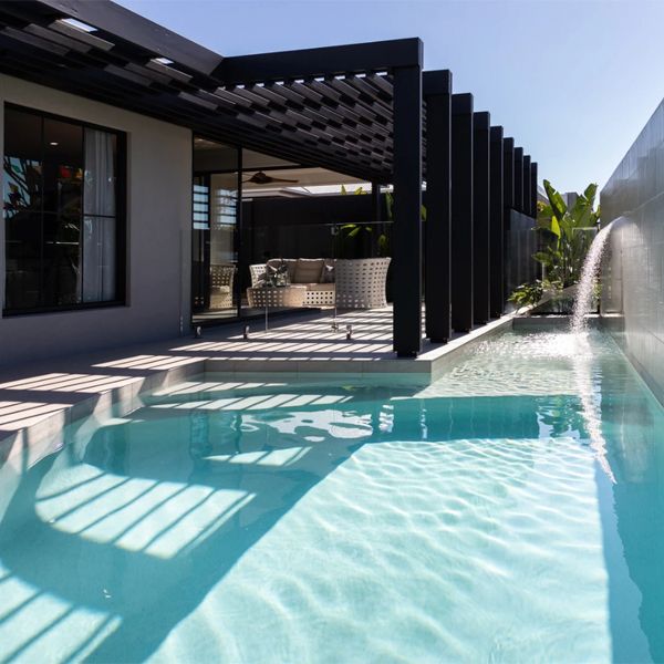 custom pool and water features in a project by Nature Pools and Landscapes