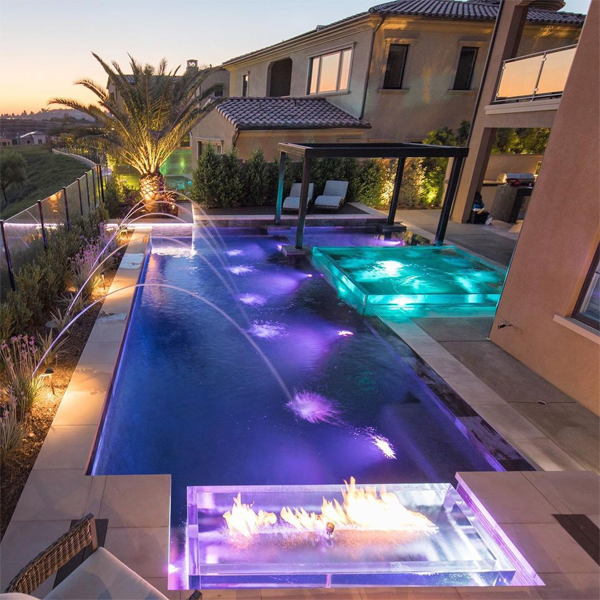 pool and transparent spa at night