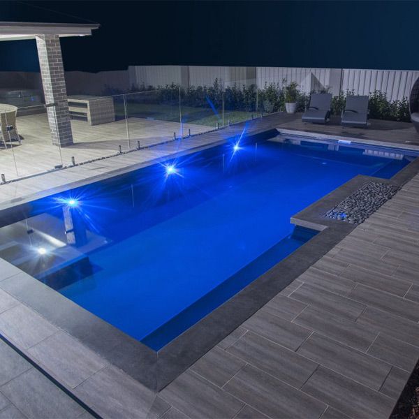 rectangular prefab dark pool at night