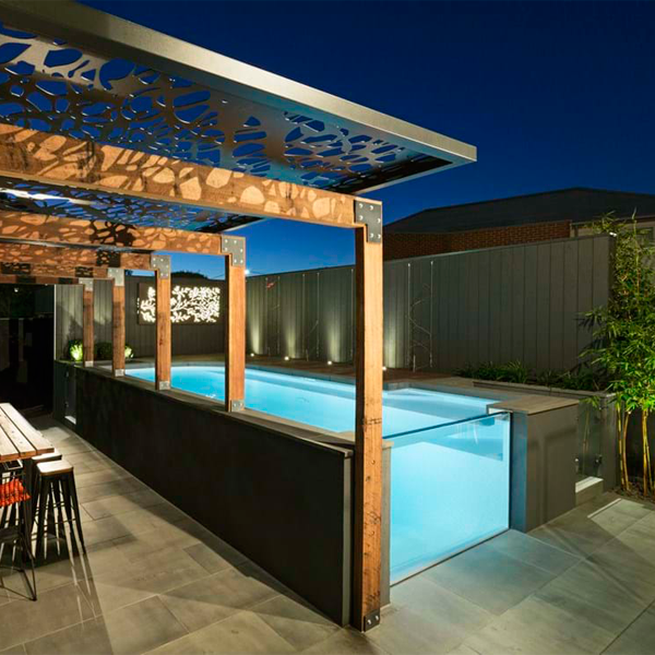 above ground pool with an undewater window by Enki Pools