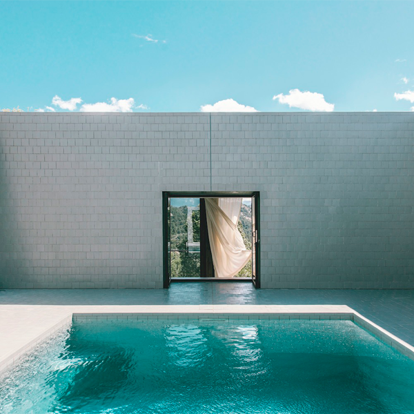 minimalist pool with an underwater window by PEZO VON ELLRICHSHAUSEN