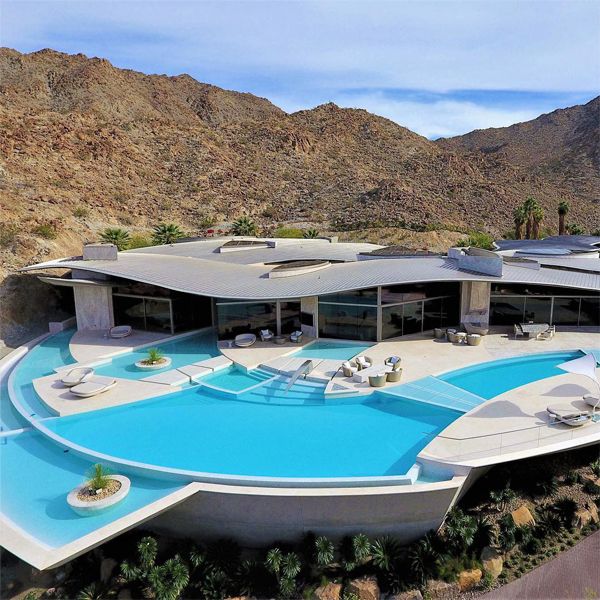 drone view of an impressive project of different customized pool spaces with an ultra modern design, by A & N Pools in Palm Desert (California)