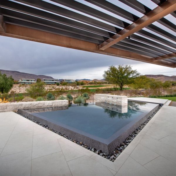 custom infinity pool with spa by Ozzie Kraft