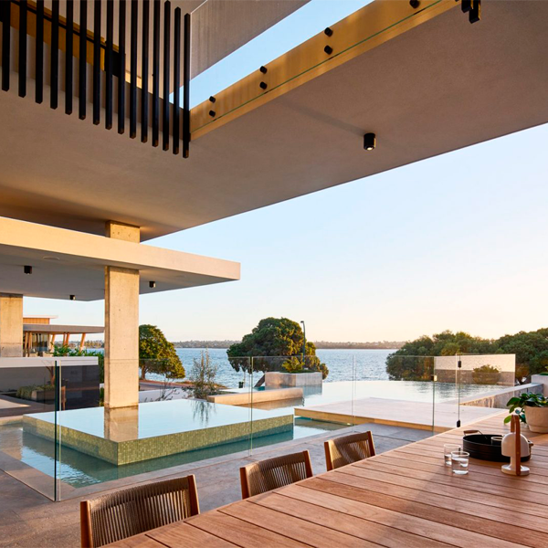 custom infinity pool and spa by Blue Stone Pools in a modern project by Averna Homes