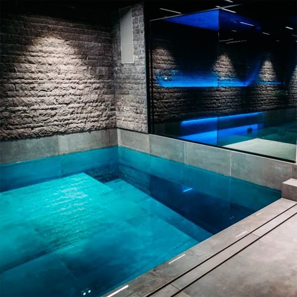 indoor overflow pool, by Mari