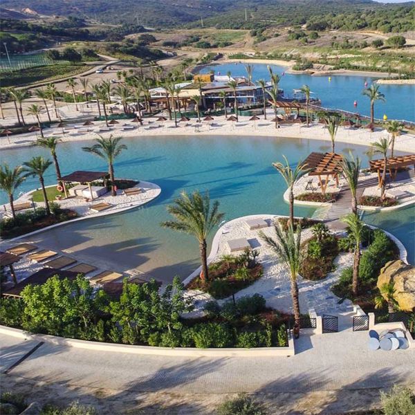 drone view of a custom sand pool, beach type, for a resort, designed by Myrtha Pools