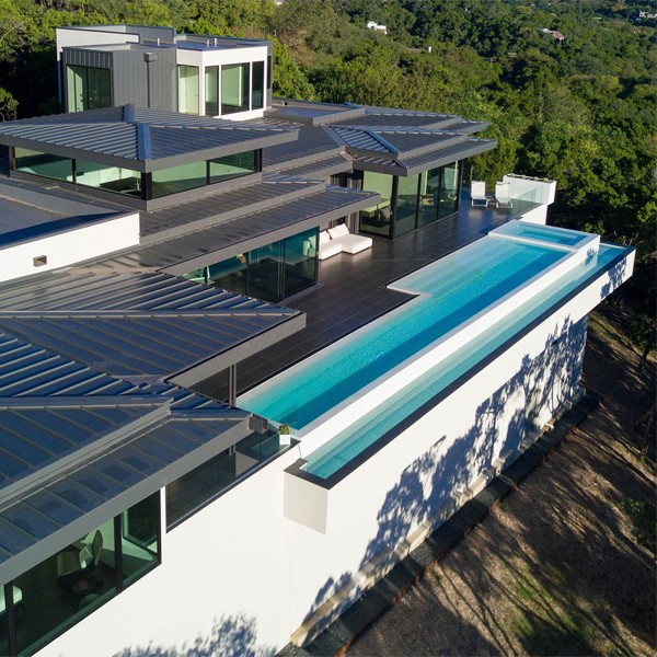 white infinity pool with spa by Design Aquatics