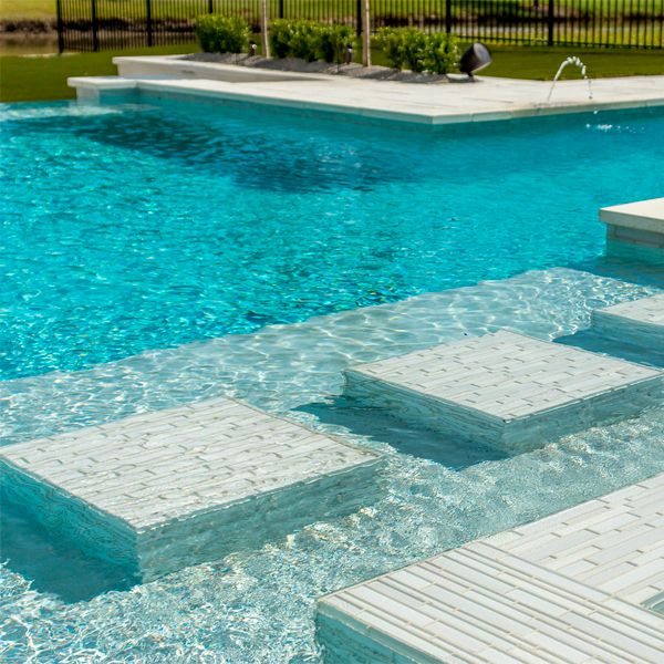 tile coating in a custom modern infinity pool with spa, by Makaira Landscape Pools