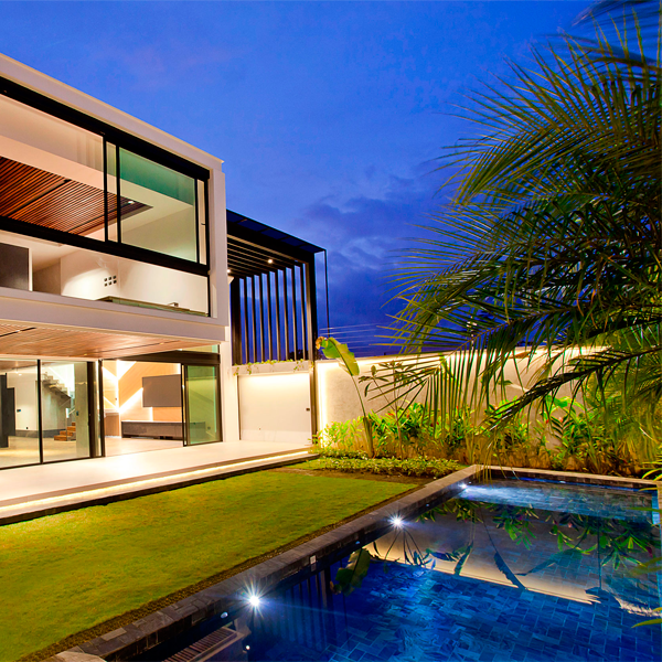 private pool with coating in natural stone at night, by QBO3